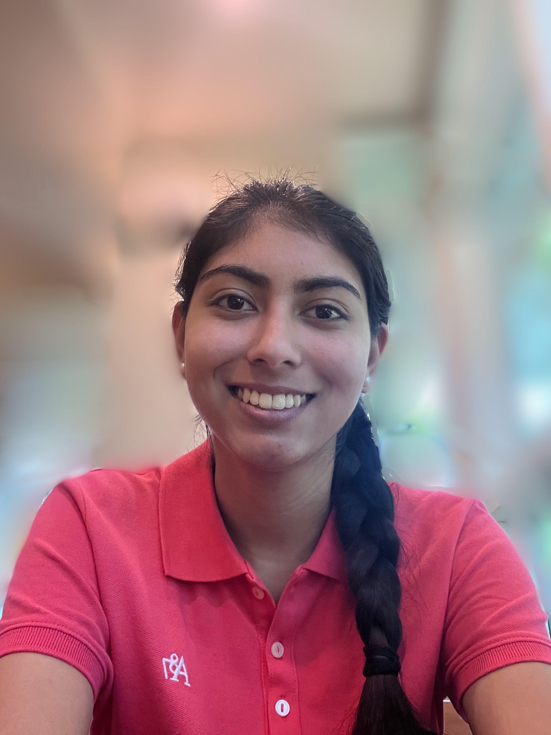 picture of Vedika wearing a pink shirt